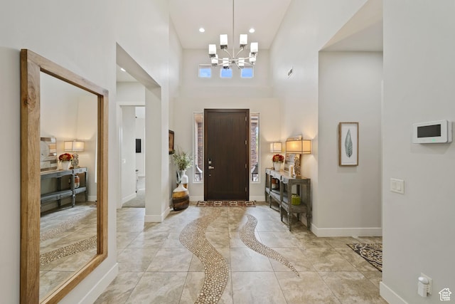 2356 S 1300 W, St George, UT 84770 - foyer entrance featuring recessed lighting, an inviting chandelier, a towering ceiling, and baseboards
