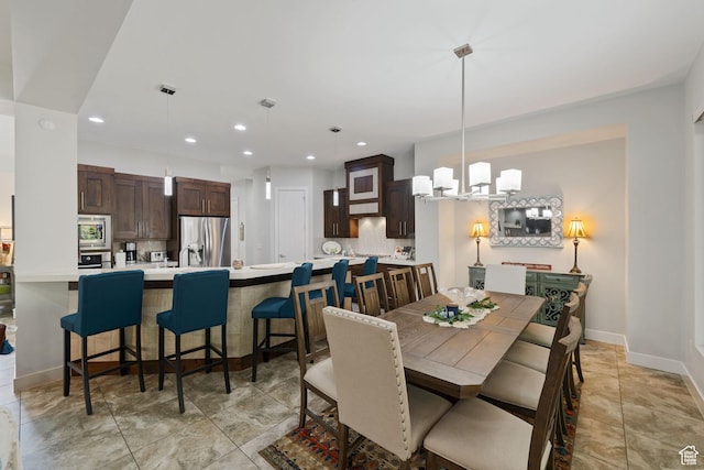 2356 S 1300 W, St George, UT 84770 - dining area with baseboards, a chandelier, and recessed lighting
