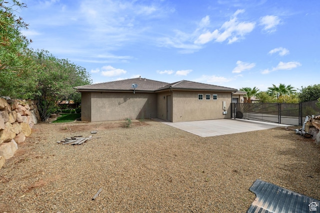 2356 S 1300 W, St George, UT 84770 - back of property featuring a patio, stucco siding, and fence
