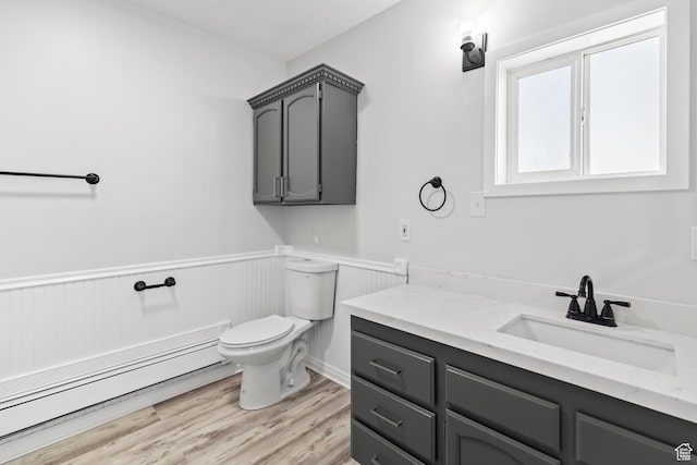 604 S Desert Willow Ln, Salina, UT 84654 - bathroom with toilet, a wainscoted wall, wood finished floors, and vanity