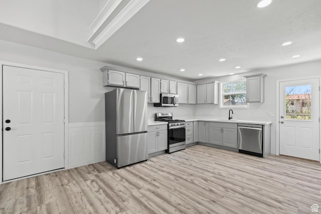 604 S Desert Willow Ln, Salina, UT 84654 - kitchen with appliances with stainless steel finishes, light wood-type flooring, recessed lighting, and gray cabinets