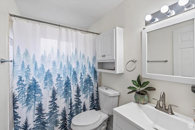 2669 S Liberty Ave E, Ogden, UT 84401 - bathroom with toilet, vanity, and a shower with curtain