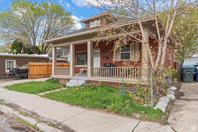2669 S Liberty Ave E, Ogden, UT 84401 - view of front of property with fence and covered porch
