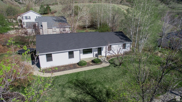 64 Winding Way, Logan, UT 84321 - view of front of home with a shingled roof and a front lawn