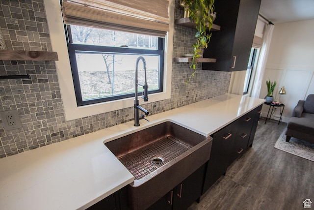 64 Winding Way, Logan, UT 84321 - kitchen with tasteful backsplash, open shelves, a sink, dark wood finished floors, and dark cabinets