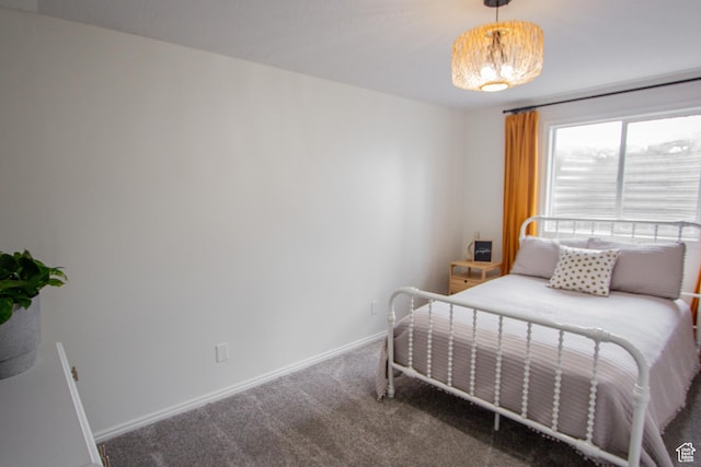 64 Winding Way, Logan, UT 84321 - carpeted bedroom with baseboards