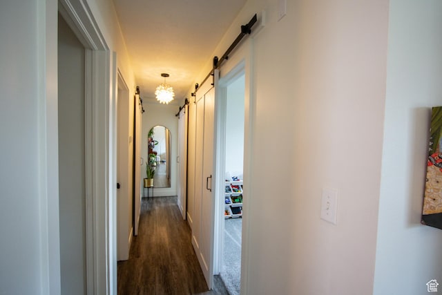 64 Winding Way, Logan, UT 84321 - hall with dark wood finished floors and a barn door