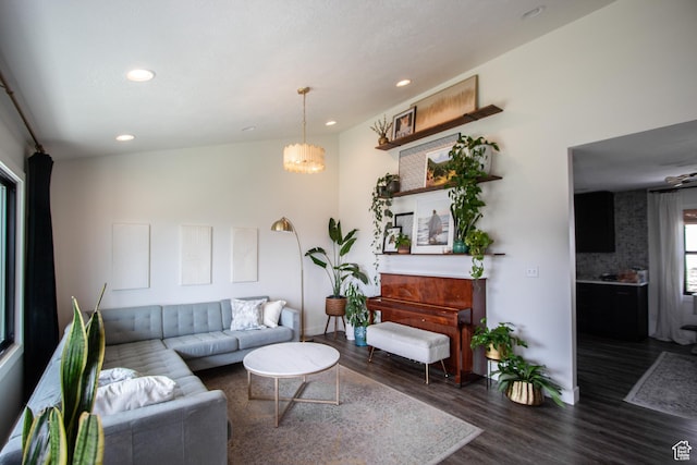 64 Winding Way, Logan, UT 84321 - living room featuring dark wood finished floors, baseboards, a notable chandelier, and recessed lighting