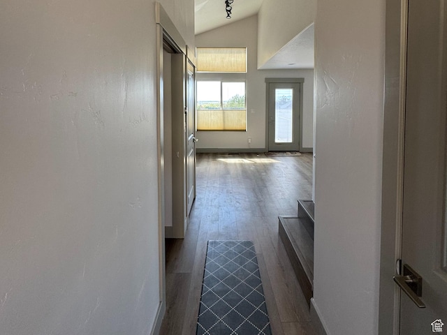 1126 E Bench View Dr N, Ogden, UT 84404 - hallway featuring dark wood finished floors, vaulted ceiling, and baseboards