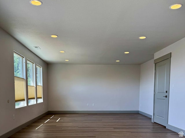 1126 E Bench View Dr N, Ogden, UT 84404 - empty room featuring visible vents, baseboards, wood finished floors, and recessed lighting