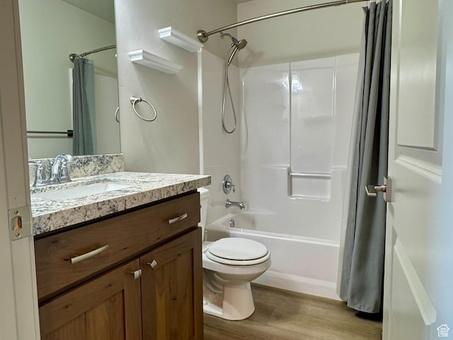 1126 E Bench View Dr N, Ogden, UT 84404 - bathroom featuring wood finished floors, shower / bath combo with shower curtain, toilet, and vanity