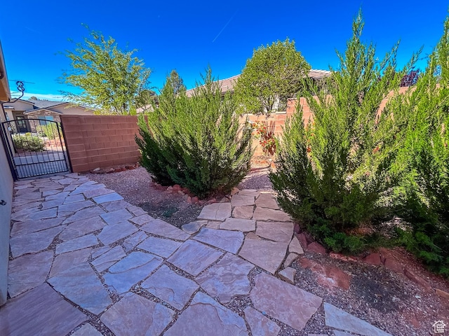 view of patio / terrace with a gate and fence