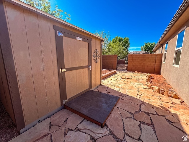 exterior space with fence and a gate