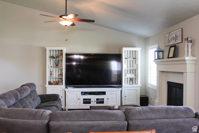 3158 S 2985 W, West Haven, UT 84401 - living room with a ceiling fan, lofted ceiling, and a glass covered fireplace