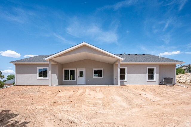 1152 E Smokey Trail Way, Cedar City, UT 84721 - back of house with stucco siding, central AC, and a shingled roof