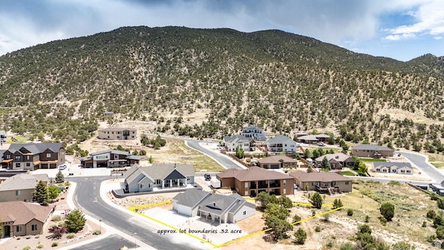 1152 E Smokey Trail Way, Cedar City, UT 84721 - aerial perspective of suburban area featuring a mountain backdrop