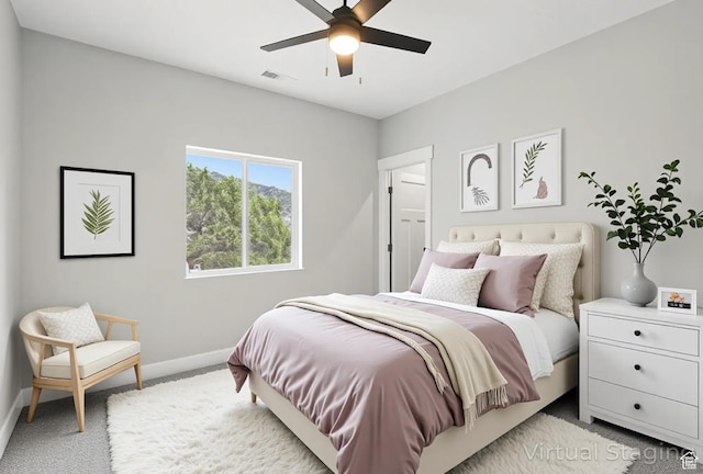 1152 E Smokey Trail Way, Cedar City, UT 84721 - bedroom featuring baseboards, light carpet, and ceiling fan