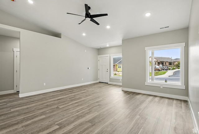 1152 E Smokey Trail Way, Cedar City, UT 84721 - unfurnished living room with wood finished floors, ceiling fan, baseboards, and recessed lighting