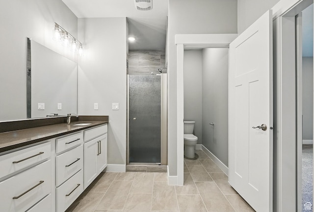 1152 E Smokey Trail Way, Cedar City, UT 84721 - bathroom featuring vanity, a shower stall, toilet, baseboards, and tile patterned flooring