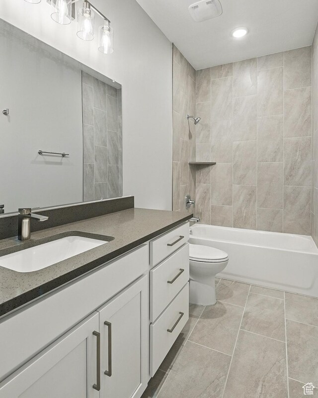 1152 E Smokey Trail Way, Cedar City, UT 84721 - bathroom with vanity, toilet, shower / bath combination, tile patterned flooring, and recessed lighting