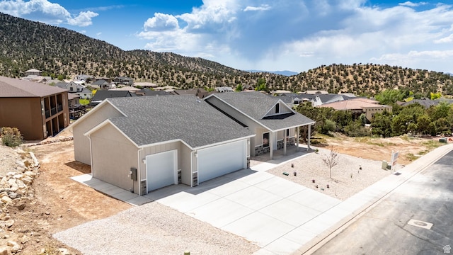 1152 E Smokey Trail Way, Cedar City, UT 84721 - aerial perspective of suburban area featuring mountains