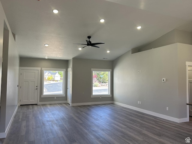 1152 E Smokey Trail Way, Cedar City, UT 84721 - unfurnished living room with ceiling fan, dark wood finished floors, baseboards, recessed lighting, and vaulted ceiling