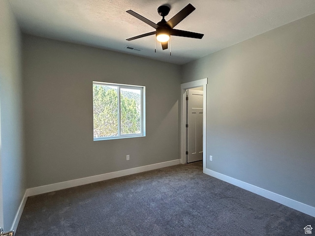 1152 E Smokey Trail Way, Cedar City, UT 84721 - empty room featuring ceiling fan, baseboards, and dark colored carpet