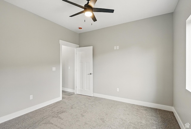 1152 E Smokey Trail Way, Cedar City, UT 84721 - empty room with light colored carpet, a ceiling fan, and baseboards