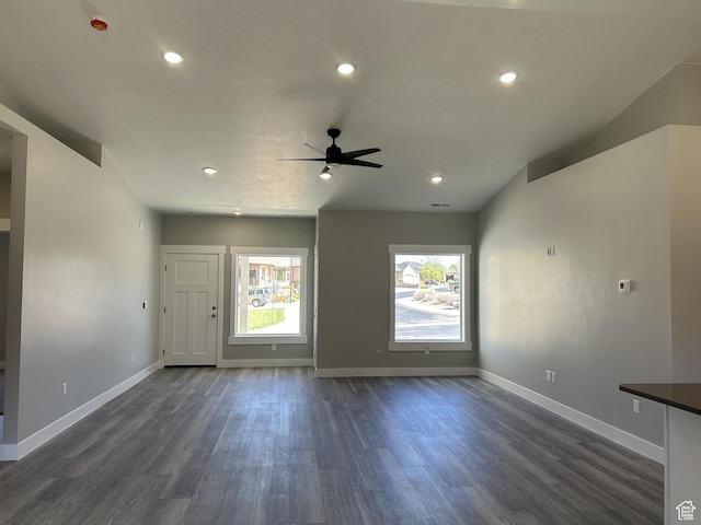 1152 E Smokey Trail Way, Cedar City, UT 84721 - unfurnished living room featuring a ceiling fan, dark wood-style flooring, baseboards, and recessed lighting
