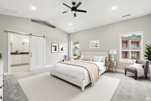 1152 E Smokey Trail Way, Cedar City, UT 84721 - bedroom with light carpet, a barn door, lofted ceiling, baseboards, and ensuite bathroom