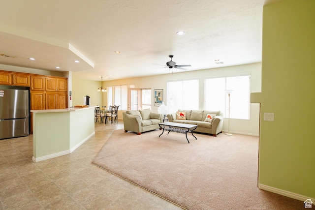 living room featuring recessed lighting, visible vents, baseboards, and ceiling fan