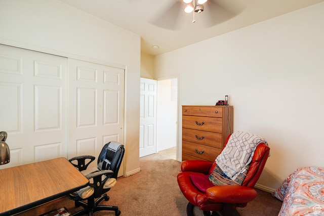 office featuring light colored carpet and a ceiling fan