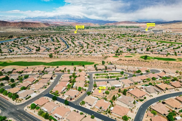 drone / aerial view with a mountain view and a residential view