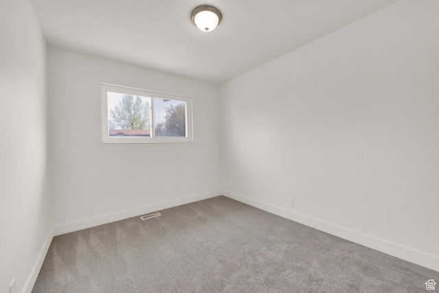 5148 W Redflower Cir, West Valley City, UT 84120 - carpeted empty room featuring baseboards and visible vents