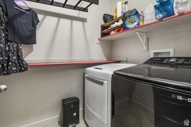 6961 W Goblin Valley Cv S, West Jordan, UT 84081 - clothes washing area with independent washer and dryer and laundry area
