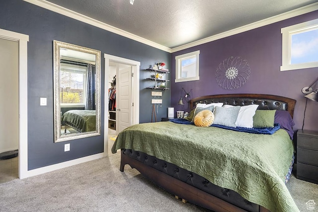 6961 W Goblin Valley Cv S, West Jordan, UT 84081 - carpeted bedroom featuring a walk in closet, baseboards, ornamental molding, and a textured ceiling