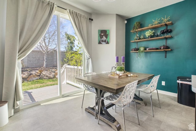 6961 W Goblin Valley Cv S, West Jordan, UT 84081 - dining space with baseboards