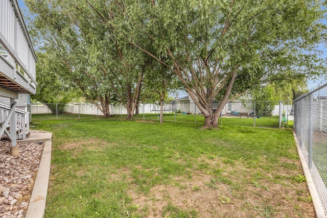 view of yard featuring a fenced backyard