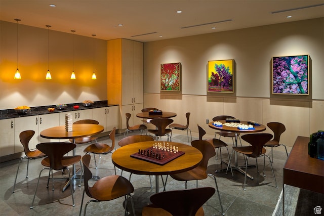 interior space featuring a wainscoted wall