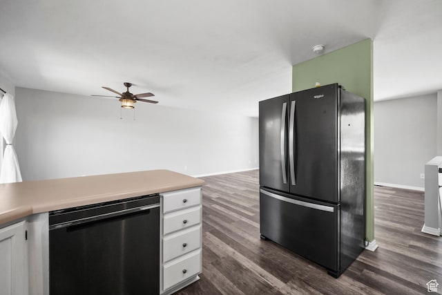 kitchen with dark wood-style floors, ceiling fan, white cabinetry, dishwasher, and freestanding refrigerator