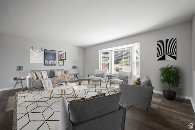 living room with baseboards and light wood-style floors