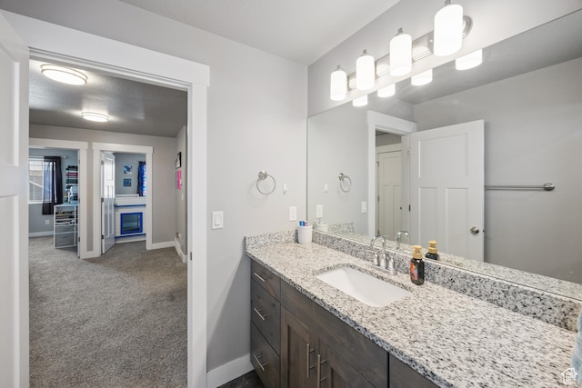 2448 W Anne Ave S, West Haven, UT 84401 - bathroom featuring baseboards and vanity