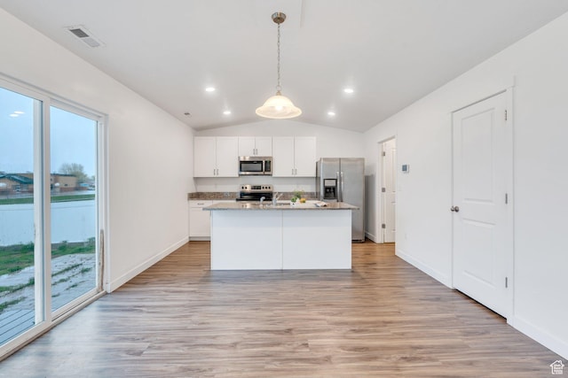 1784 S 360 W, Payson, UT 84651 - kitchen featuring appliances with stainless steel finishes, light wood-style flooring, lofted ceiling, white cabinetry, and visible vents