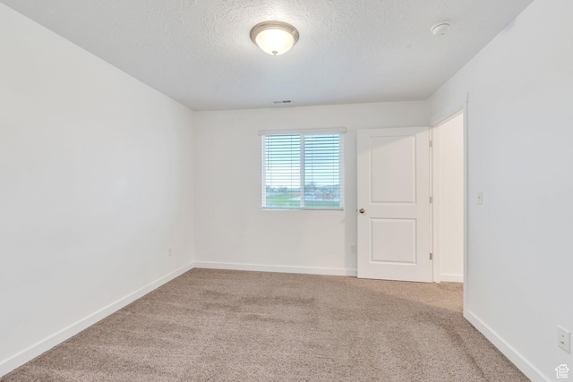 1784 S 360 W, Payson, UT 84651 - empty room featuring baseboards, carpet, and a textured ceiling