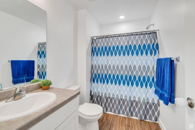 1784 S 360 W, Payson, UT 84651 - full bathroom featuring wood finished floors, vanity, a shower with shower curtain, and toilet