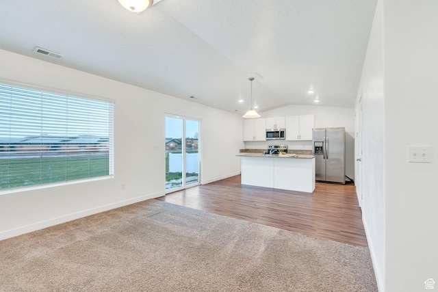 1784 S 360 W, Payson, UT 84651 - kitchen with stainless steel appliances, light carpet, open floor plan, visible vents, and lofted ceiling