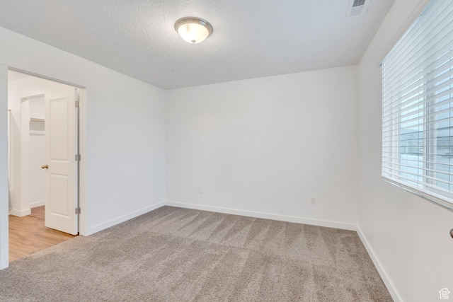 1784 S 360 W, Payson, UT 84651 - spare room featuring visible vents, baseboards, and light carpet