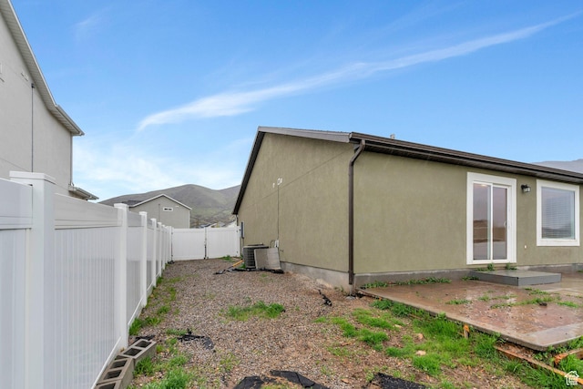 1784 S 360 W, Payson, UT 84651 - view of property exterior featuring a fenced backyard and central AC unit