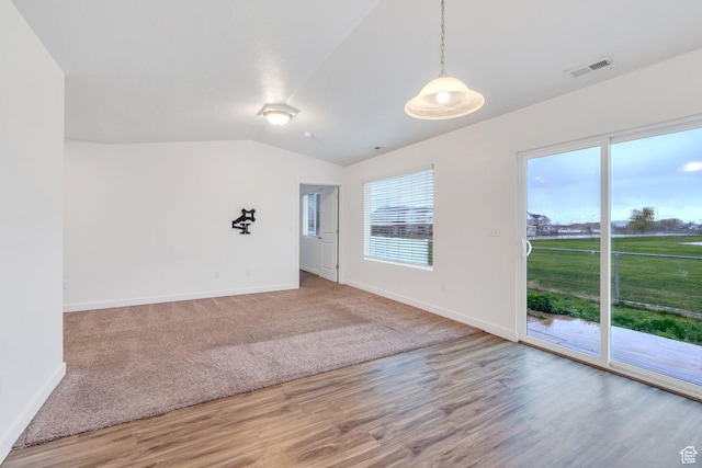 1784 S 360 W, Payson, UT 84651 - spare room featuring vaulted ceiling, visible vents, baseboards, and wood finished floors