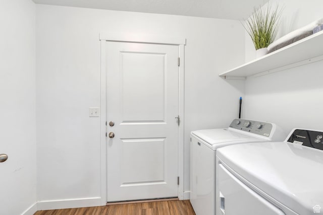 1784 S 360 W, Payson, UT 84651 - laundry room featuring washing machine and dryer, wood finished floors, and laundry area